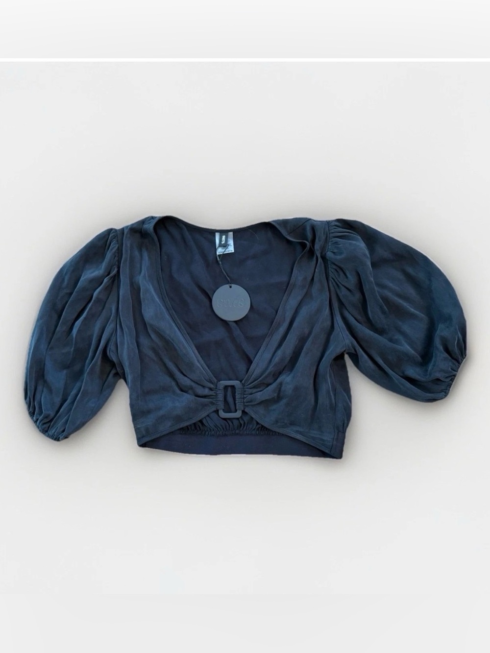 Women's Black Puff-Sleeve Cropped Top with Buckle Detail
Smoke Free
Pet Free